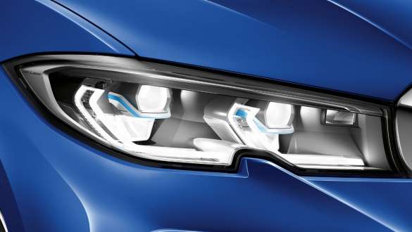 BMW 3シリーズ セダン、BMW レーザー・ライト。G20 BMW レーザー・ライトを備えたフロント左側のクローズ・アップ。G20