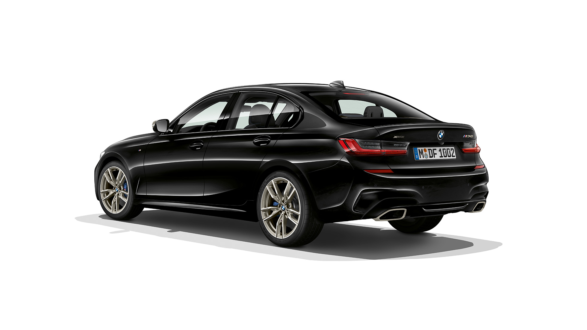 BMW M340i xDrive、リヤ・ビュー。G20 BMW M340i xDrive、スリークォーター・リヤ・ビュー。G20