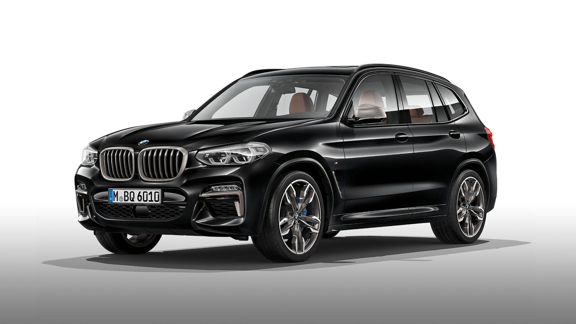 BMW X3 M40d、サイドビュー。F97 BMW X3 M40d のブラック・サファイア・メタリックカラー、エクステリア、サイドビュー。F97