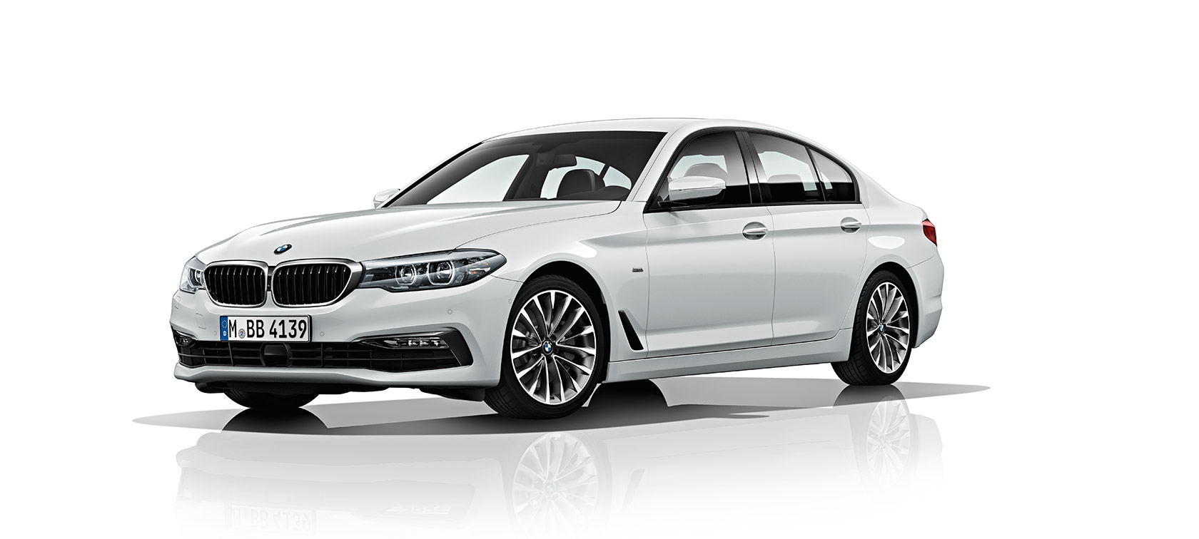 BMW 5シリーズ セダン Three quarter front view of the BMW 5 Series Sedan in white.